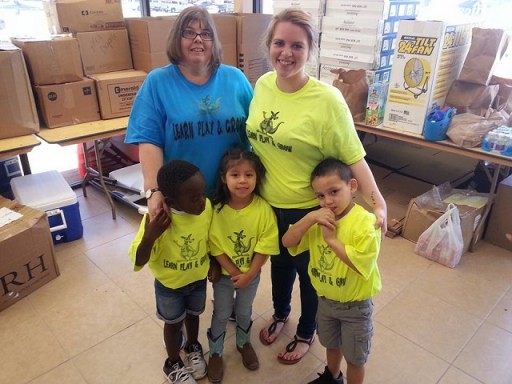 Very young volunteers who assisted with the unloading and distribution of the supplies in Texas.